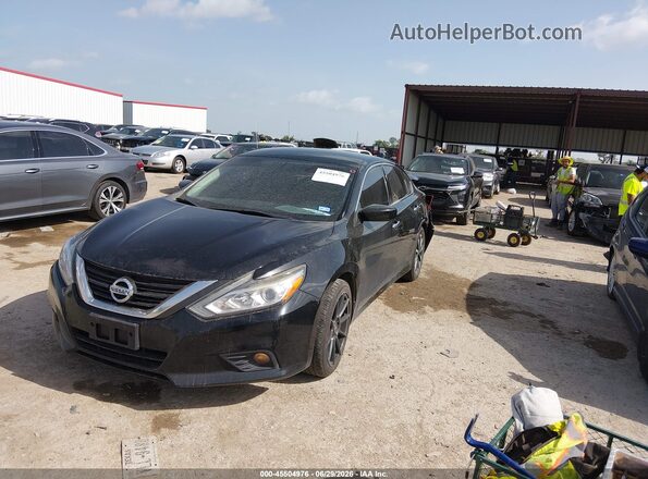 1N4AL3AP4JC207781 2018 NISSAN ALTIMA Black Առջևի ձախ երեք քառորդ տեսարան