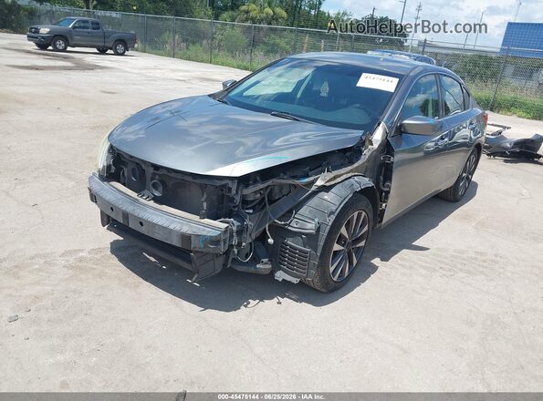 1N4AL3AP6GC146216 2016 NISSAN ALTIMA Gray Vista tres cuartos delantera izquierda