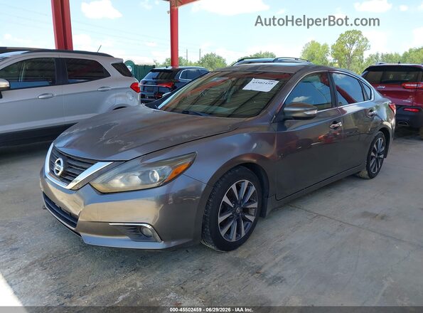1N4AL3AP6GC221237 2016 NISSAN ALTIMA Gray Vista tres cuartos delantera izquierda