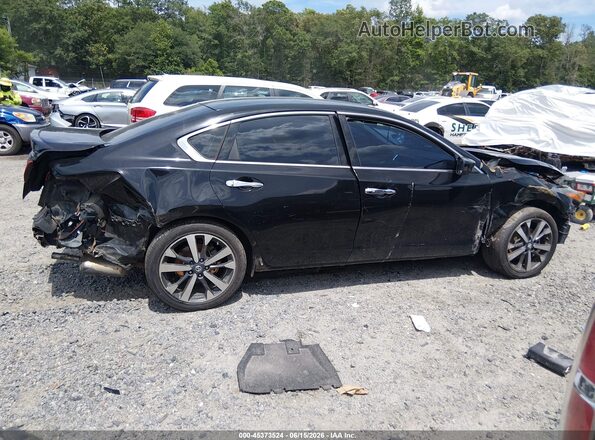 1N4AL3AP7GN390946 2016 NISSAN ALTIMA Black Widok wnętrza z tyłu