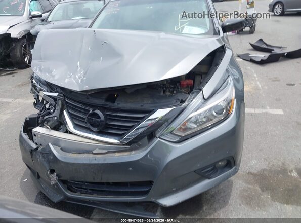 1N4AL3AP7JC288470 2018 NISSAN ALTIMA Gray Vista del salpicadero