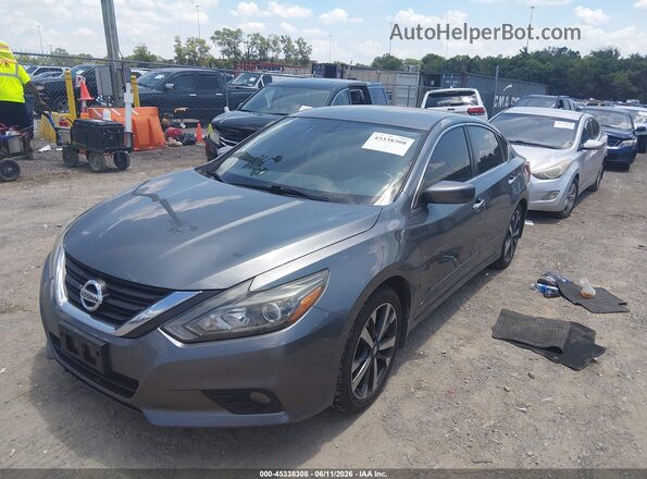 1N4AL3AP9GC215092 2016 NISSAN ALTIMA Gray Vista tres cuartos delantera izquierda