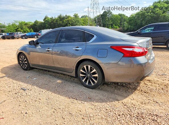 1N4AL3AP9GC219367 2016 NISSAN ALTIMA Gray Trasero izquierdo