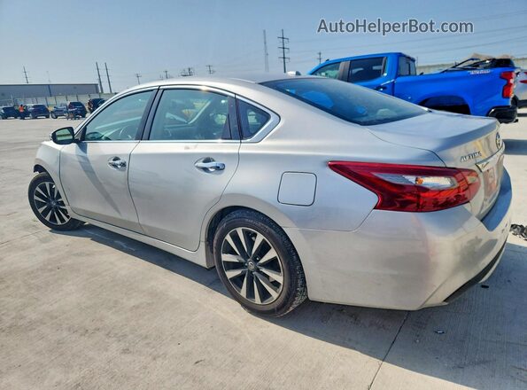 1N4AL3AP9JC121026 2018 NISSAN ALTIMA Silver Trasero izquierdo