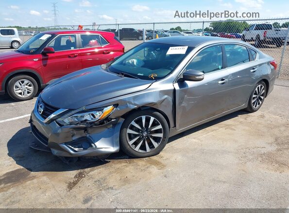 1N4AL3AP9JC146685 2018 NISSAN ALTIMA Gray Vista tres cuartos delantera izquierda