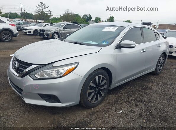 1N4AL3AP9JC163423 2018 NISSAN ALTIMA Silver Front view