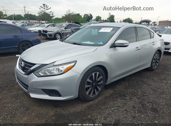 1N4AL3AP9JC163423 2018 NISSAN ALTIMA Silver Front left