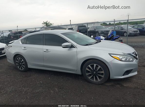1N4AL3AP9JC163423 2018 NISSAN ALTIMA Silver Rear interior view