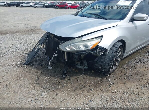 1N4AL3AP9JC173353 2018 NISSAN ALTIMA Silver Դիմացի տեսք