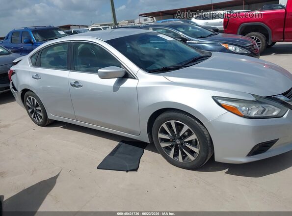 1N4AL3AP9JC245099 2018 NISSAN ALTIMA Silver Սալոնի հետևի տեսք