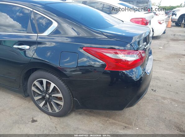 1N4AL3APXJC174320 2018 NISSAN ALTIMA Black Widok z przodu