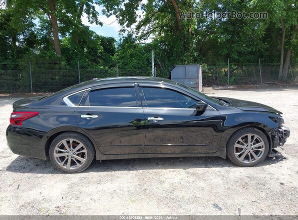 1N4AL3APXJC189240 2018 NISSAN ALTIMA Black Rear interior view