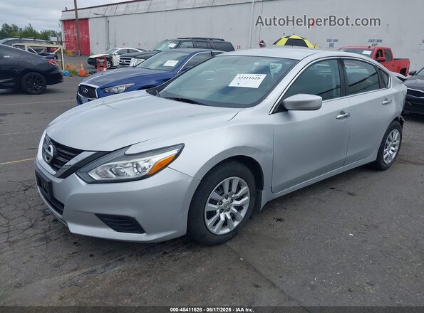 1N4AL3APXJC260890 2018 NISSAN ALTIMA Silver Przód lewy