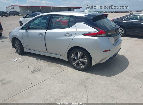 1N4BZ1CP2KC310395 2019 NISSAN LEAF Silver Trasero izquierdo