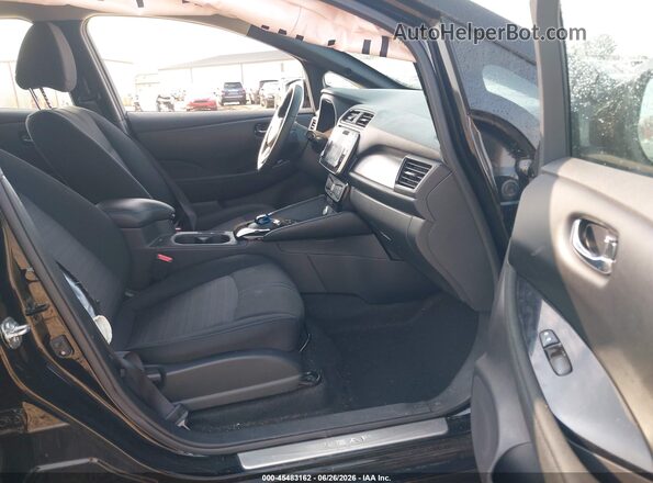 1N4CZ1CV1SC560519 2025 NISSAN LEAF Черный Вид салона спереди