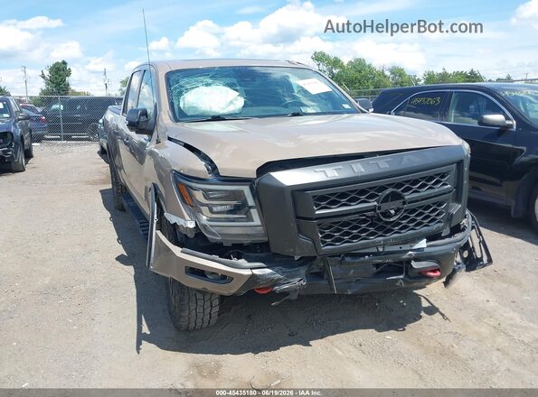 1N6AA1ED3MN517544 2021 NISSAN TITAN Brown Widok z przodu