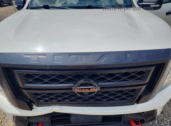 1N6AA1ED4LN511508 2020 NISSAN TITAN White Вид задньої частини салону
