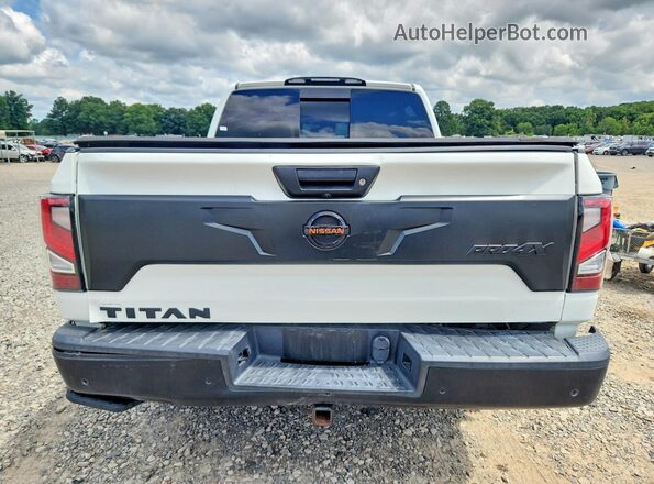 1N6AA1ED4LN511508 2020 NISSAN TITAN White Вид ззаду