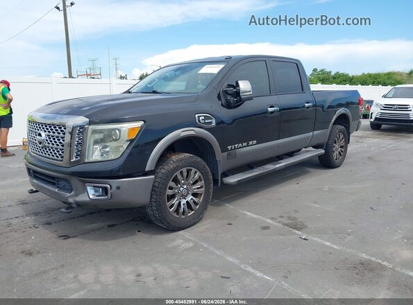 1N6BA1F22GN506637 2016 NISSAN TITAN XD Black Vista tres cuartos delantera izquierda