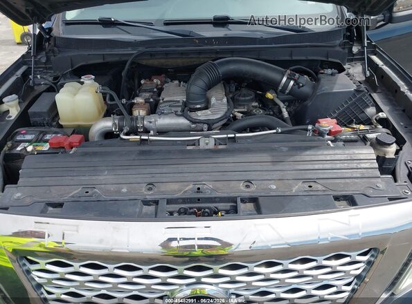 1N6BA1F22GN506637 2016 NISSAN TITAN XD Black Vista trasera