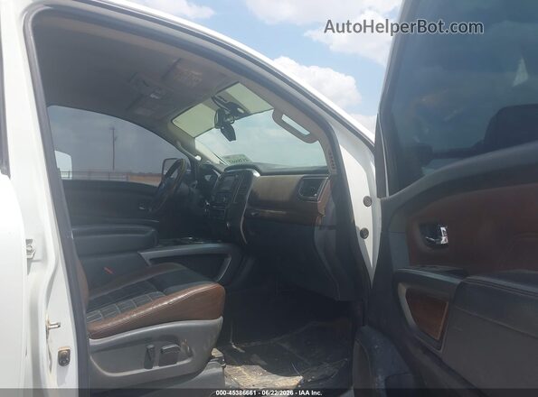 1N6BA1F29GN509406 2016 NISSAN TITAN XD White Front interior view