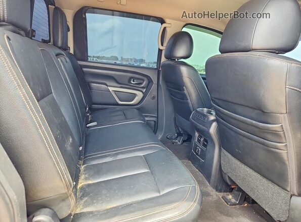 1N6BA1F42GN504243 2016 NISSAN TITAN Gray Rear seats view