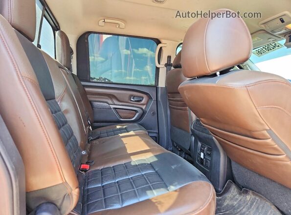 1N6BA1F43GN502971 2016 NISSAN TITAN Red Rear seats view