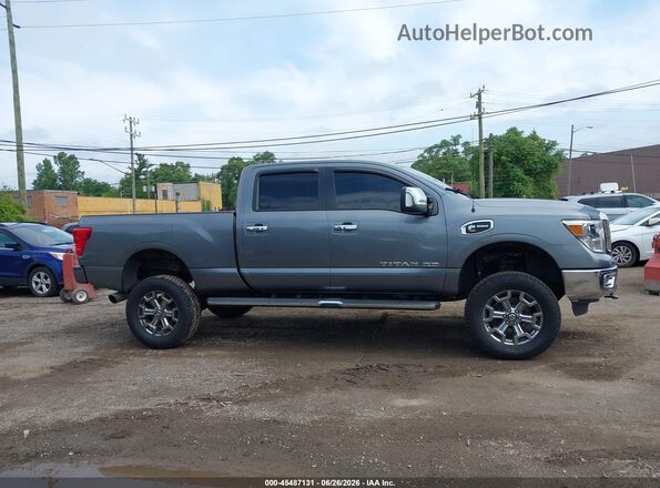 1N6BA1F43JN525660 2018 NISSAN TITAN XD Gray Widok wnętrza z tyłu