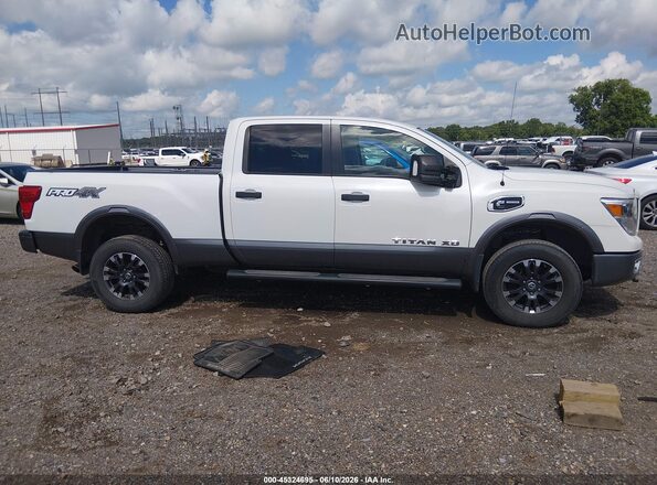 1N6BA1F43KN511095 2019 NISSAN TITAN XD White Vista interior trasera