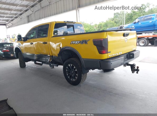 1N6BA1F44HN558001 2017 NISSAN TITAN XD Yellow Հետևի ձախ