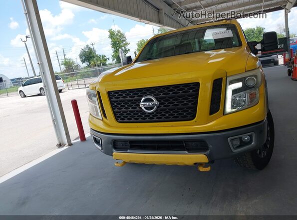 1N6BA1F44HN558001 2017 NISSAN TITAN XD Yellow Սարքավորումների վահանակի տեսք