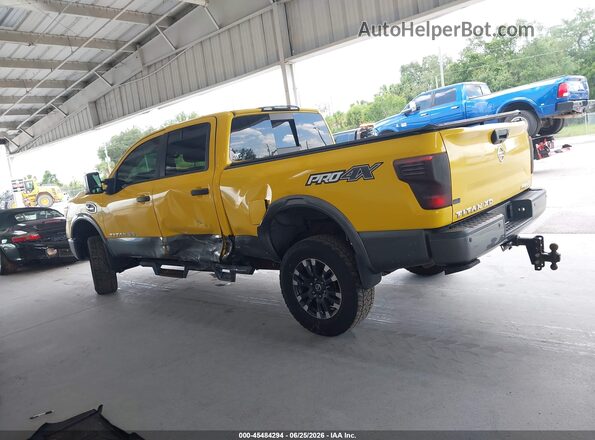 1N6BA1F44HN558001 2017 NISSAN TITAN XD Yellow Սալոնի 360 աստիճան տեսք