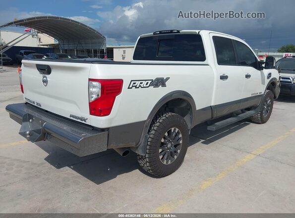 1N6BA1F45KN506867 2019 NISSAN TITAN XD White Հետևի աջ