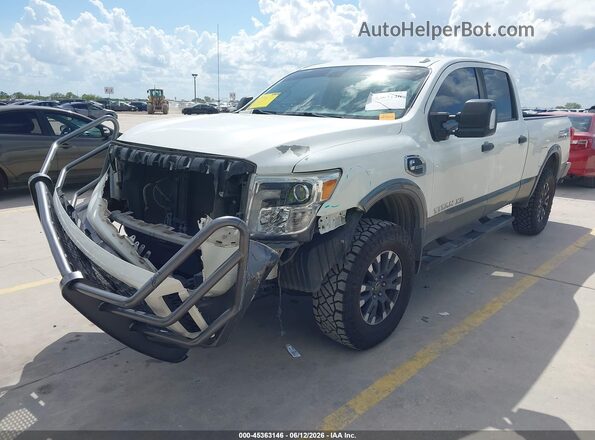 1N6BA1F45KN506867 2019 NISSAN TITAN XD White Առջևի ձախ երեք քառորդ տեսարան