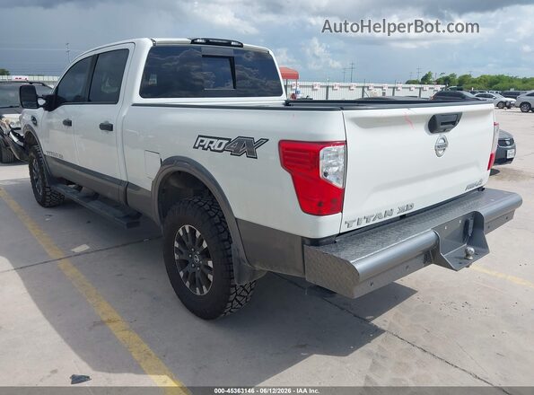 1N6BA1F45KN506867 2019 NISSAN TITAN XD White Հետևի ձախ