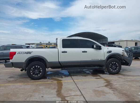 1N6BA1F45KN506867 2019 NISSAN TITAN XD White Սալոնի հետևի տեսք