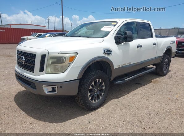 1N6BA1F47HN536879 2017 NISSAN TITAN XD Белый Передняя левая четверть