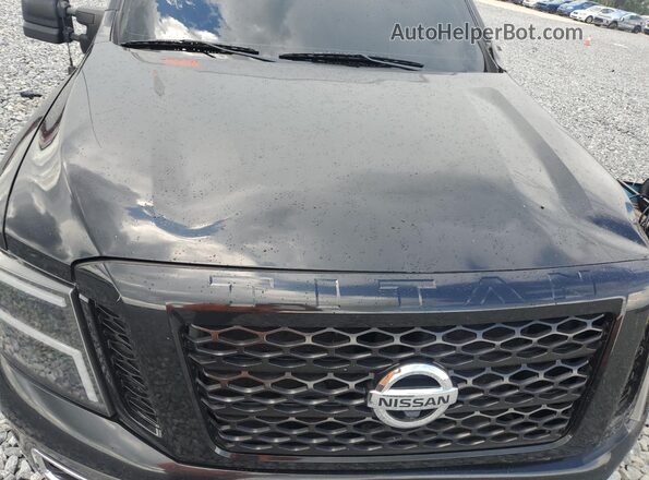 1N6BA1F48HN567283 2017 NISSAN TITAN Black Вид задньої частини салону