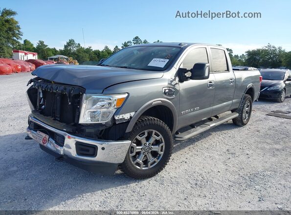 1N6BA1F48JN541062 2018 NISSAN TITAN XD Gray Vista tres cuartos delantera izquierda