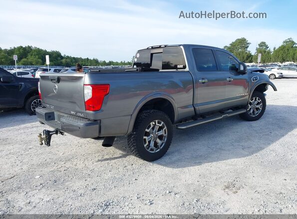 1N6BA1F48JN541062 2018 NISSAN TITAN XD Gray Trasero derecho