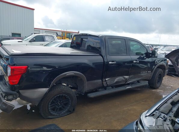 1N6BA1F48KN526840 2019 NISSAN TITAN XD Black Սալոնի հետևի տեսք