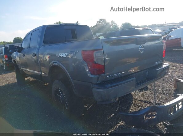 1N6BA1F49JN527266 2018 NISSAN TITAN XD Gray Rear left
