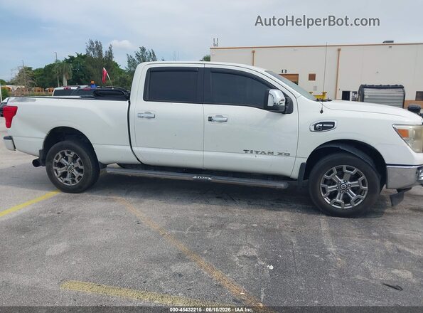 1N6BA1F4XHN568130 2017 NISSAN TITAN XD White Rear interior view