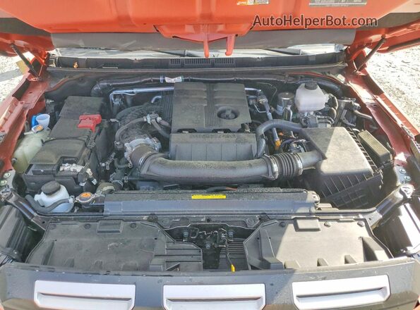 1N6ED1EK2SN654043 2025 NISSAN FRONTIER Orange Rear interior view