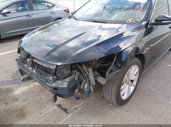 1VWBA7A3XJC024309 2018 VOLKSWAGEN PASSAT Black Front view
