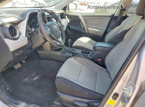 JTMRJREV5JD213856 2018 TOYOTA RAV4 Серебряный Вид панели приборов