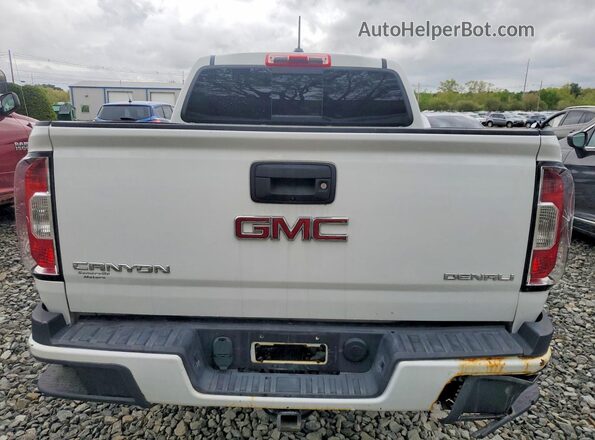 1GTP6EE13J1302082 2018 GMC CANYON White წინა სალონის ხედი