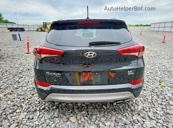 KM8J3CA23HU576503 2017 HYUNDAI TUCSON Black Front interior view
