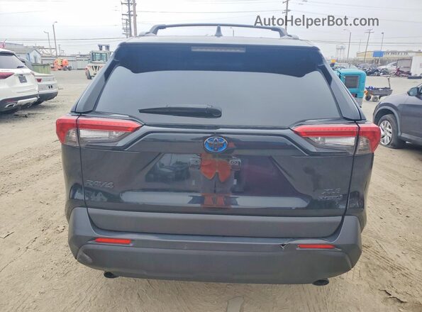 JTMB6RFV3PD083067 2023 TOYOTA RAV4 Black Front interior view