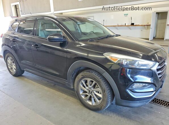 KM8J3CA49GU142764 2016 HYUNDAI TUCSON Black 
